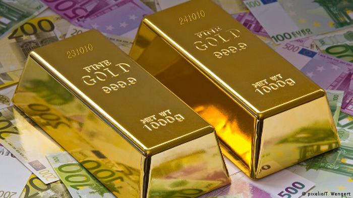 Precio del oro cae por subida del dólar a máximo en 5 años